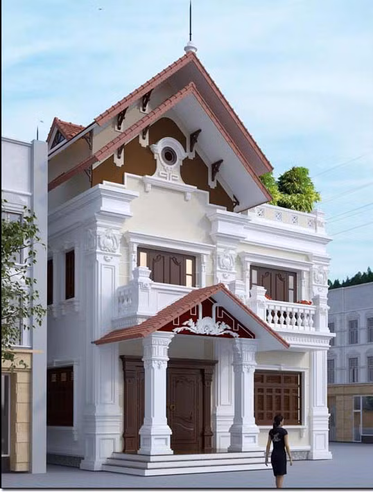 Kiến trúc ngôi biệt thự 2 tầng phong cách cổ điển mái dốc sang trọng với hệ thống phào chỉ được đắp vẽ tinh tế. Ảnh: Shac.