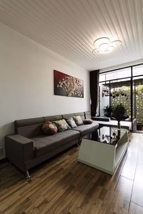 Phòng khách thoáng mát và hiện đại. Ảnh: Archdaily.