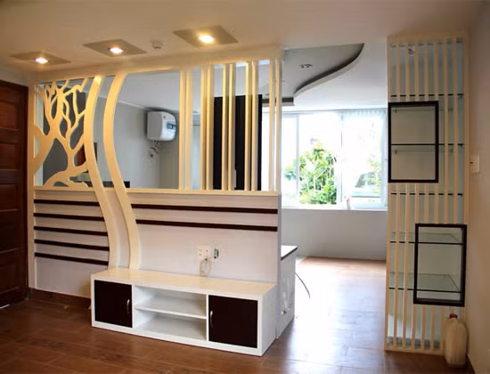 Ý tưởng thiết kế bàn bar mini kết hợp vách ngăn phòng giúp mang lại sự ngăn cách rõ rệt hơn cho căn phòng. Ảnh: Noithatducduong.