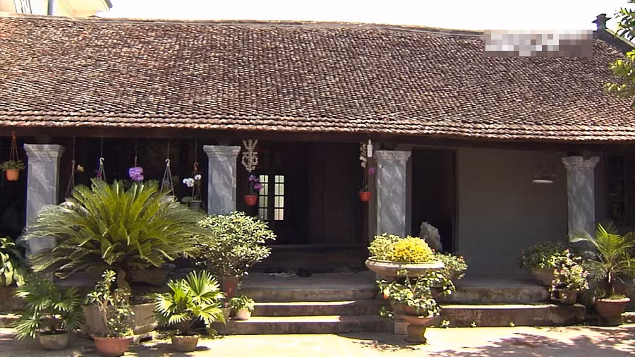 Gìn giữ nét truyền thống của ngôi nhà bằng cột nhà bê tông theo kiến trúc hiện đại. Ảnh: VTC14.