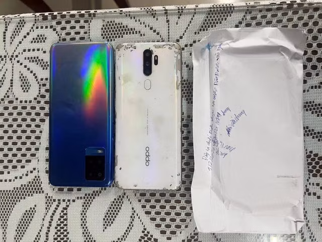 Bat giu doi tuong giat dien thoai cua 2 me con dang cho tau-Hinh-2