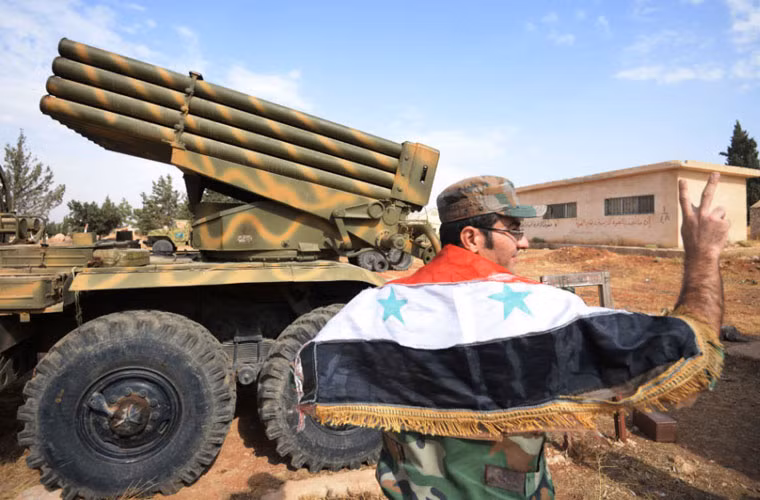 Pháo phản lực phóng loạt Grad đặt ở vị trí ngoại vi Aleppo.