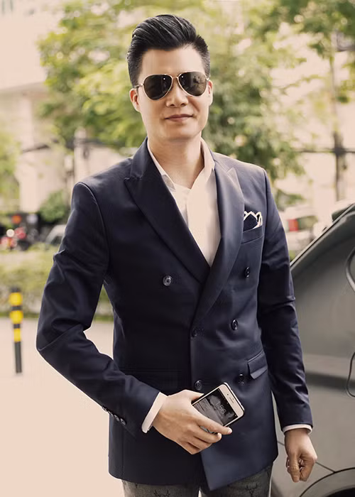 Hình ảnh Quang Dũng tại buổi họp báo giới thiệu liveshow “Giấc mơ mang tên mình” vào chiều ngày 15/2.