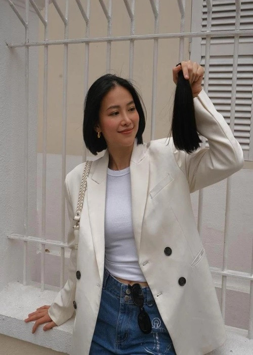 Người đẹp chia sẻ: “Tóc của Khánh rồi sẽ dài lại và phần cắt đi có thể giúp người khác tự tin hơn và biết được rằng họ không một mình”. Ảnh: FBNV.