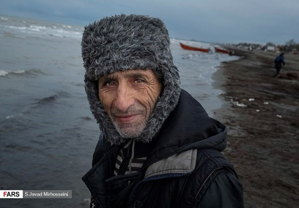 Một ngư dân mỉm cười trước ống kính. FNA.