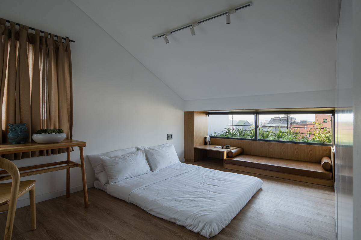 Phòng ngủ thiết kế đơn giản cho du khách có cảm giác dễ chịu.