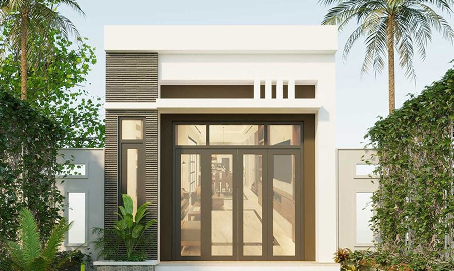 Nhà cấp 4 có gác lửng mái bằng có thiết kế mới lạ với sự kết hợp của sơn trắng - xám và hệ cửa kính hiện đại. Phía trước nhà là khu vườn trồng nhiều cây xanh. Ảnh: Musk