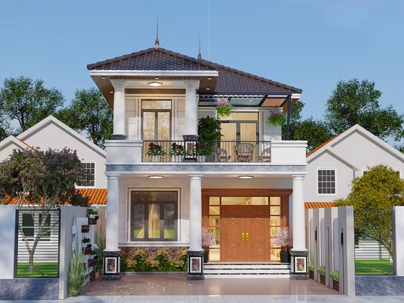 Nhờ thiết kế cỏ cây, hoa lá với nhiều màu sắc đa dạng, ngôi nhà 2 tầng mái Nhật trở nên bắt mắt hơn. Ảnh: Angcovat