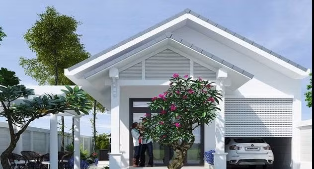 Mẫu nhà mái thái từ 300 - 400 triệu được xây dựng trên diện tích 90m2, có gara để xe. Phía ngoài sân có thể thiết kế thêm tiểu cảnh. Ảnh: Thietkenhadepmoi