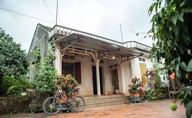 Ngôi nhà của gia đình Nguyễn Thị Oanh cũ kỹ, đã ngả màu theo thời gian. Ảnh: Dân trí