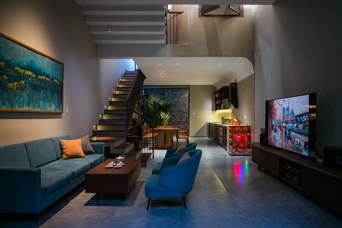 Phòng khách bài trí đơn giản, màu sắc nội thất nhẹ nhàng.