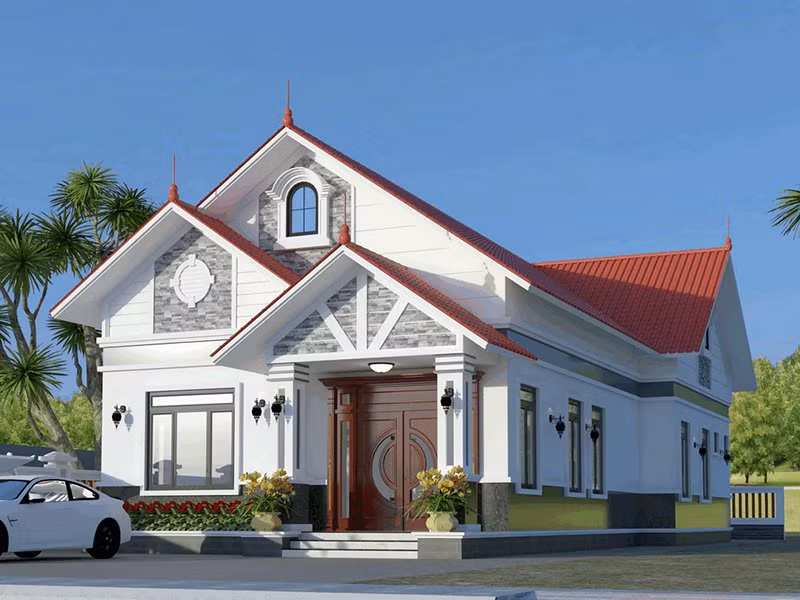 Nhà cấp 4 mái thái ấn tượng với sân vườn xanh mát và nền sơn trắng chủ đạọ. Ảnh: Wedo