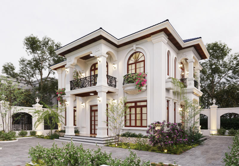 Nhà mái Nhật 2 tầng có điểm nhấn là các phào chỉ, hoa văn đậm chất tân cổ điển. Lan can sắt với hoa văn cầu kỳ tạo nên cũng góp phần tạo nên sự độc đáo cho ngôi nhà. Ảnh: Kienthietviet