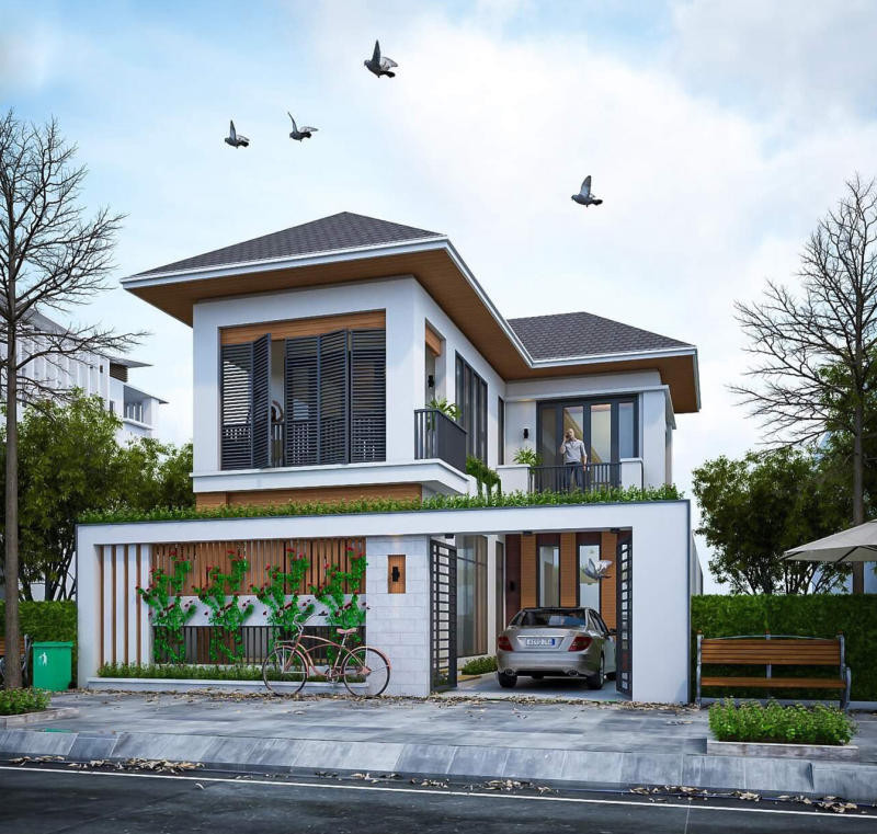 Mẫu nhà 2 tầng chữ L mái Nhật kết hợp hài hòa với hệ mái màu tối ốp trần gỗ tạo ấn tượng. Ảnh: Kienthietviet