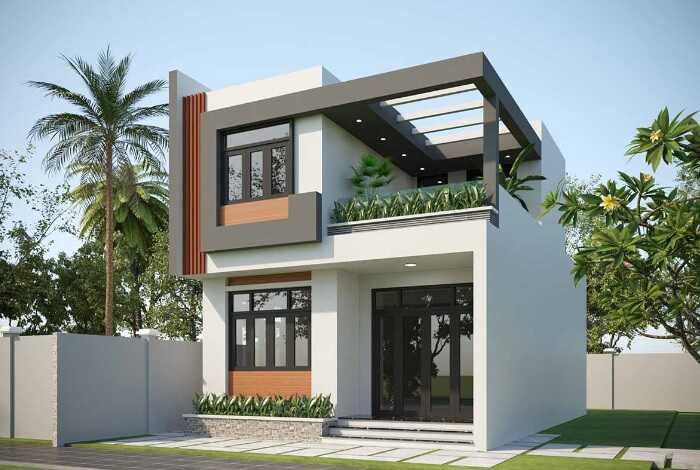 Nhà ống 2 tầng 6x11m đẹp trang nhã. Các mảng tường trang trí sử dụng sơn xám ghi đậm trên nền tường trắng giúp nổi bật hình khối vuông vức. Ảnh: Xaydungcuonggiahieu