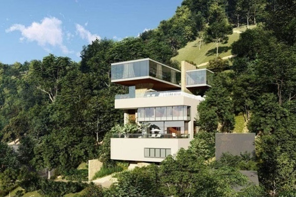 Căn biệt thự nằm bình yên giữa rừng, view biển và ba mặt kính đón sáng.