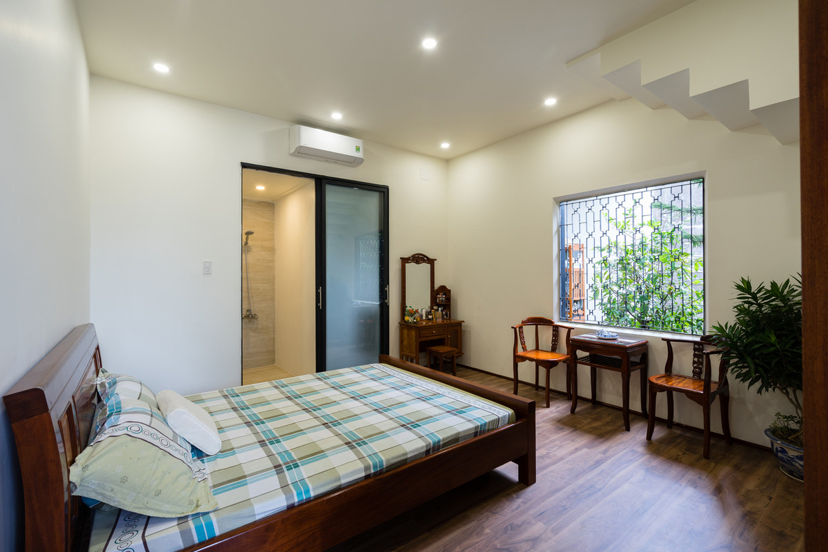 Phòng ngủ đơn giản và thoáng đãng. Nguồn ảnh: Quang Dam