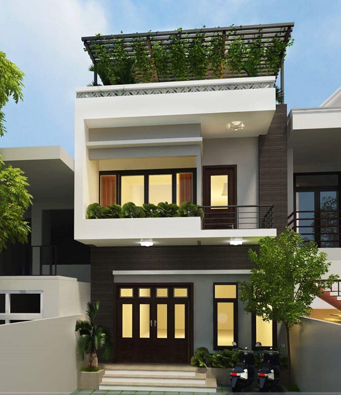 Điểm nhấn của căn nhà là ngoại thất được thiết kế từ các hình khối khoẻ khoắn, kết hợp hài hoà giữa các gam màu. Ảnh: Namidesign