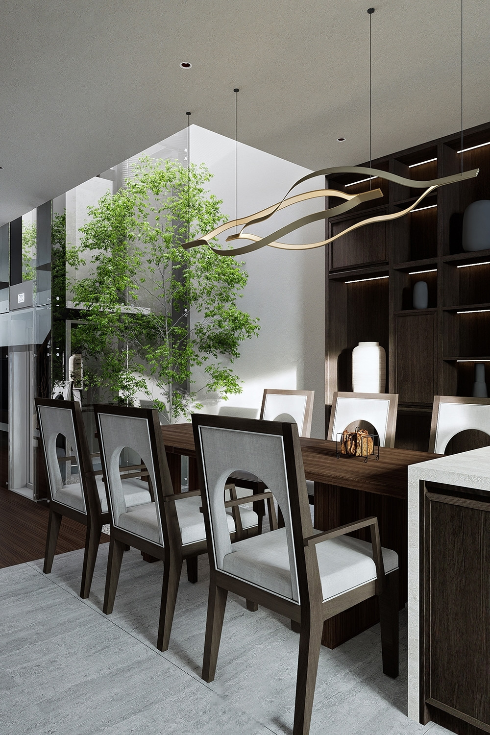 Giếng trời giúp tất cả các phòng đều có thể đón nắng và nhìn thấy view cây xanh, gần gũi thiên nhiên.