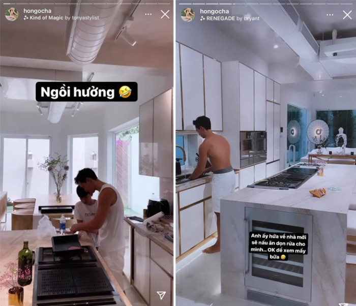 Gian bếp có gam màu trắng chủ đạo. Các vật dụng như bếp điện, bếp nướng, lò vi sóng, lò nướng được sắp xếp gọn hàng. Ảnh: chụp màn hình