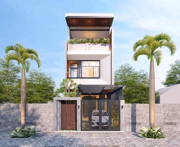 Nhà phố 2 tầng 1 tum được thiết kế khéo léo với tường sơn giả gỗ kết hợp không gian xanh và tiểu cảnh. Ảnh: Xaydungcuonggiahieu