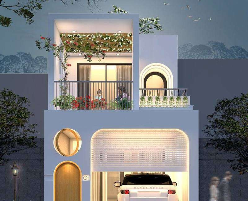 Mẫu nhà phố 2 tầng mái bằng lấy thiết kế vòng cung làm điểm nhấn. Ảnh: Muaban