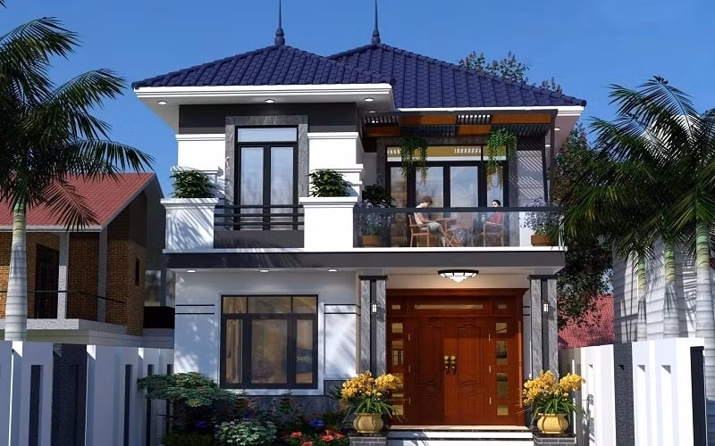 Cùng với cửa gỗ bề thế, phần mái thái làm tăng giá trị thẩm mỹ của ngôi nhà 2 tầng. Ảnh: Internet