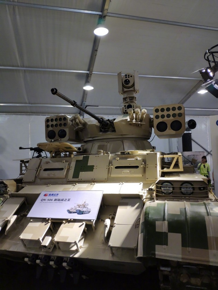 Thiết kế xe thiết giáp hạng nặng QN-506 có vẻ như sử dụng khung gầm xe tăng Type 59 đã nâng cấp với giáp phản ứng nổ ERA. Nguồn ảnh: Bmpd