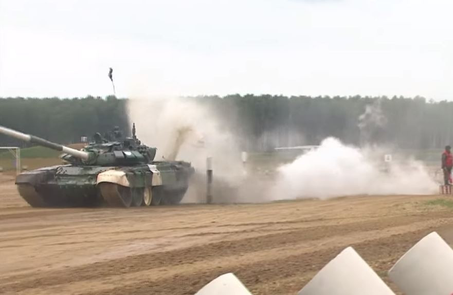 Họ về đích với thành tích 32 phút 17 giây bằng với Việt Nam, nhưng bắn hạ 3/5 bia (gồm hai bia bắn mục tiêu xe tăng cách 1.600m và 1.700m và một bia bắn trực thăng bằng súng máy 12,7mm cách 900m). Nguồn ảnh: Tzvezda.ru