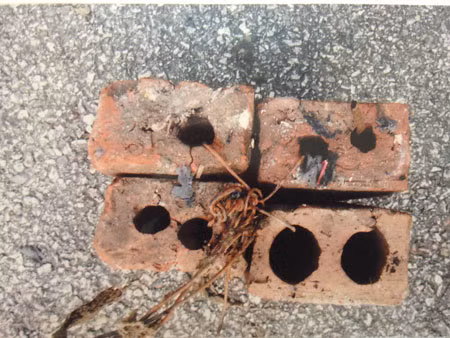 Xac nguoi duoi cong to cap vo chong sat thu mang danh 