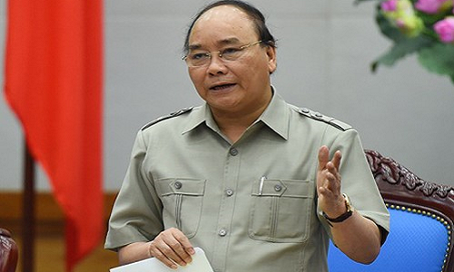 Thủ tướng Nguyễn Xuân Phúc chỉ đạo tập trung lực lượng, tìm bằng được phi công máy bay Su-30 MK2 mất tích là thượng tá Trần Quang Khải. Ảnh: VGP.