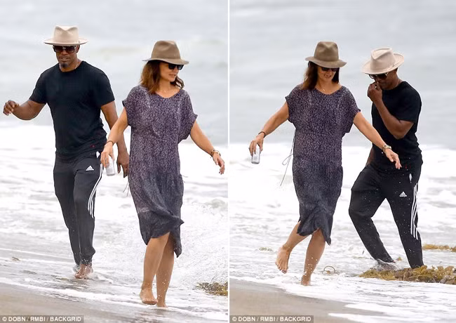 Hình ảnh hai người vui vẻ nắm tay nhau đi dạo bờ biển Malibu là hành động công khai tình cảm sau 4 năm giấu kín dù rất nhiều tin đồn bủa vây. Ảnh: Backgrid