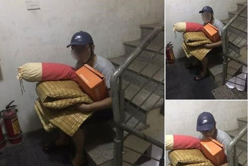 Hình ảnh ghi lại, người này mắc màn đang ngủ ngon lành. Xung quanh cũng có đủ chăn gối như đi dã ngoại. Và đây chính là hậu quả sau màn cãi nhau với vợ của anh chồng.