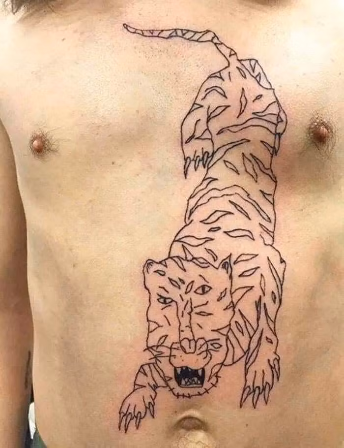 Tác phẩm xăm hổ nhìn như của 1 đứa trẻ.