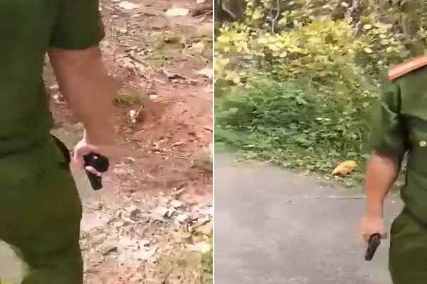 Su that clip Truong Cong an xa Hoa Hoi rut sung “doa” ban dan