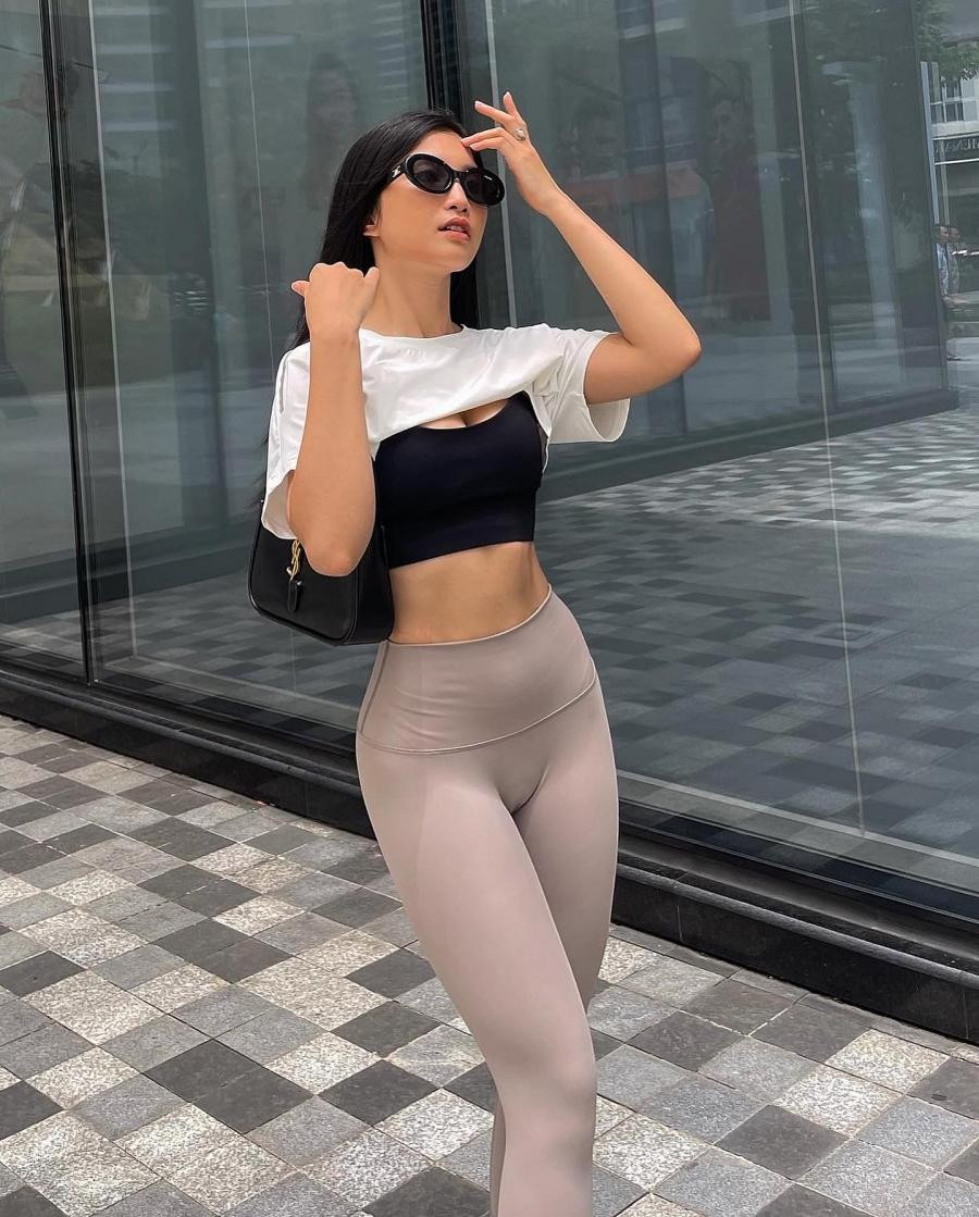  Hot girl phòng gym xinh đẹp này còn nhận được sự quan tâm khi từng đăng ký dự thi hoa hậu. Dù hạn chế về chiều cao nhưng Heri Trương lại có ba vòng nóng bỏng.