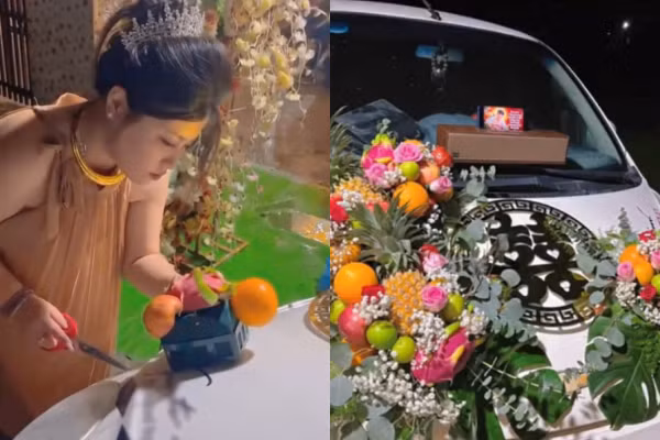 Để chiếc xe thêm phần đặc biệt, hai vợ chồng chị đã quyết định gắn trái cây và hoa tươi lên xe. Họ quan niệm dù xe cũ hay xấu nhưng vẫn phải độc lạ để đám cưới càng trở nên đặc biệt.