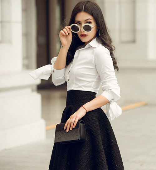 Emmy Nguyễn sở hữu nhan sắc lai tây khi mang trong mình 3 dòng máu Úc, Việt Nam và Thái Lan.