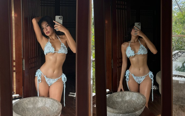 Thảo Nhi Lê khoe vòng hai với đường cơ bụng số 11 nét căng với thiết kế áo tắm hai mảnh cột dây màu xanh da trời.