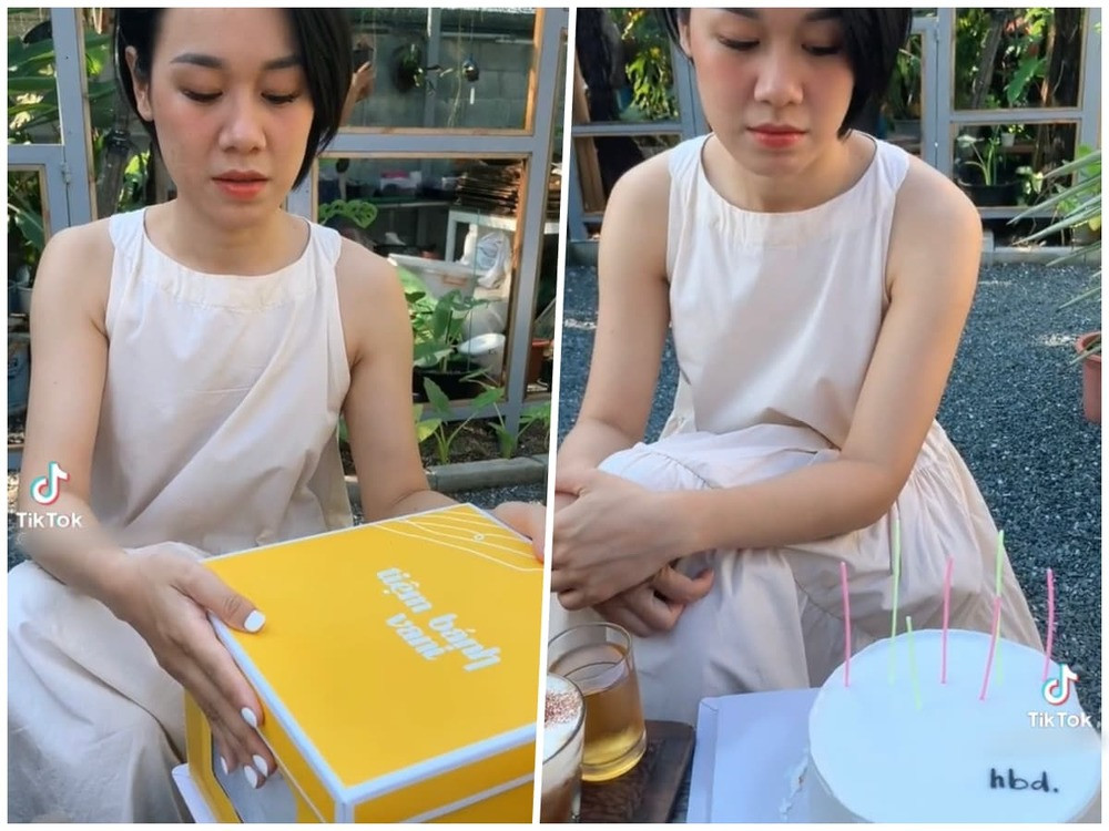 Ở bài đăng thứ nhất, cô gái áo nâu cùng các bạn ngồi tại một quán cà phê để chào đón ngày đặc biệt. Đến màn thổi nến, nhân vật chính tỏ ra khá hào hứng, lấy bánh ra khỏi hộp cẩn thận để không khiến nó bị hư. Và vào khoảnh khắc chứng kiến món quà của mình, cô bạn “đứng hình mất 3 giây” khi chiếc bánh mang một màu trắng tinh, hoàn toàn không trang trí gì, chỉ vỏn vẹn 3 chữ “hbd” (viết tắt của happy birthday – chúc mừng sinh nhật).