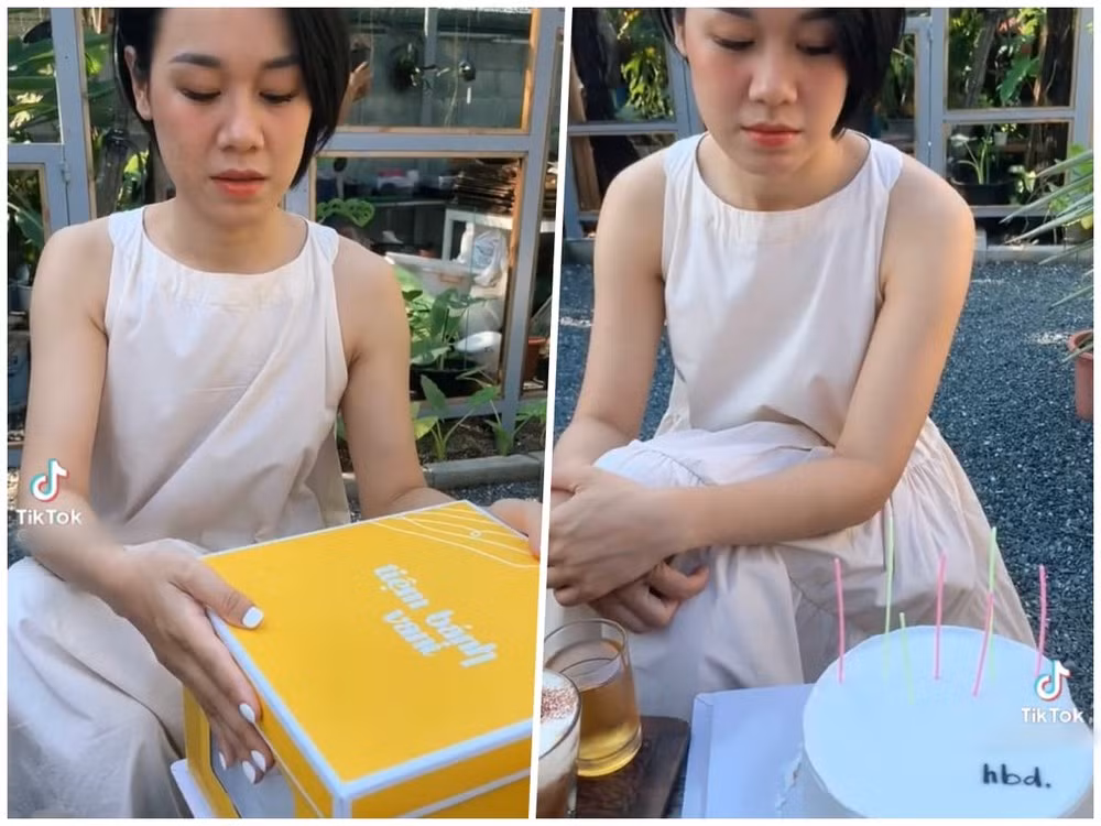 Ở bài đăng thứ nhất, cô gái áo nâu cùng các bạn ngồi tại một quán cà phê để chào đón ngày đặc biệt. Đến màn thổi nến, nhân vật chính tỏ ra khá hào hứng, lấy bánh ra khỏi hộp cẩn thận để không khiến nó bị hư. Và vào khoảnh khắc chứng kiến món quà của mình, cô bạn “đứng hình mất 3 giây” khi chiếc bánh mang một màu trắng tinh, hoàn toàn không trang trí gì, chỉ vỏn vẹn 3 chữ “hbd” (viết tắt của happy birthday – chúc mừng sinh nhật).