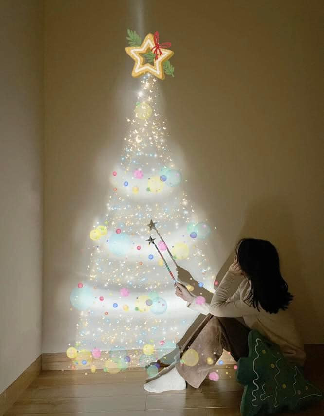 Sau khi xuất hiện trên mạng, trend chụp ảnh Giáng Sinh chỉ bằng 1 chai nước và chiếc điện thoại thu hút được vô vàn sự chú ý.