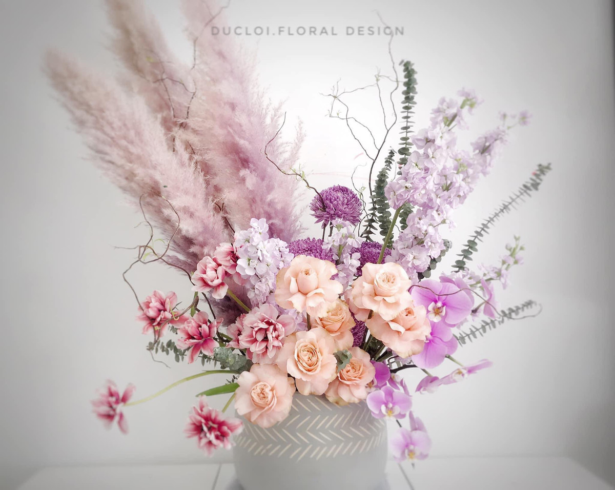 Một trong những bộ hoa mang đậm hình ảnh của mẹ nhất mà Đức Lợi từng thực hiện mang tên Hỏa được trưng bày tại Triển lãm Hoa và những người bạn ở Hà Nội.