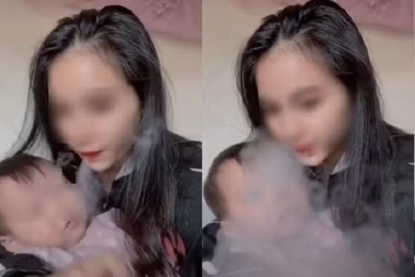 Quay clip nha khoi thuoc la vao mat em be, co gai nhan du loi chi trich