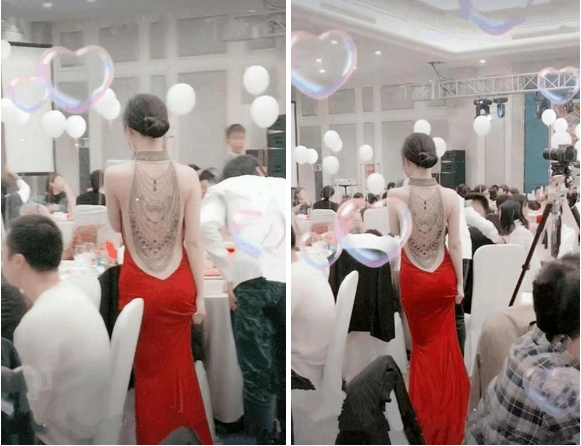 Tuy nhiên, trên thực tế chiếc váy mà cô dâu đang diện là mẫu váy cổ yếm, phần lưng sau được làm bằng vải da mỏng, đính kèm phần tua rua kết đá lấp lánh bên ngoài chứ không hoàn toàn hở lưng. Người quay video đăng tải lên mạng xã hội đã có mặt tại sự kiện cũng lên tiếng xác nhận.
