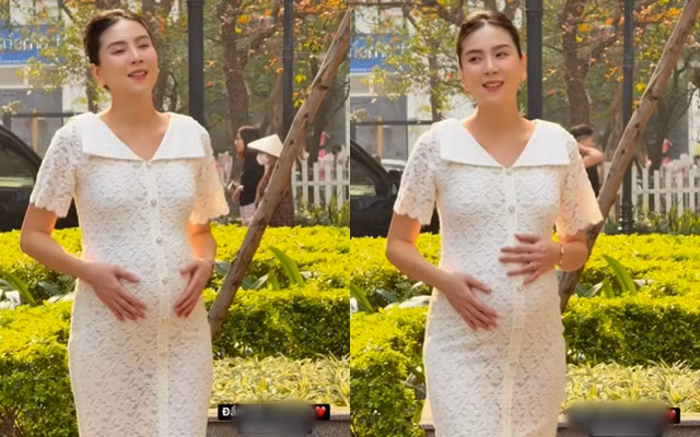 Mẹ bầu Mai Ngọc khoe nhan sắc xinh đẹp, đằm thắm. Cô tự tin diện váy ôm sát body khi đang mang bầu ở tháng thứ 8.