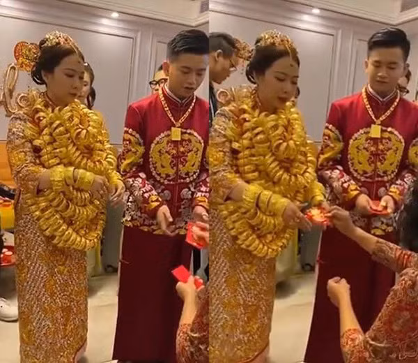 Cụ thể, trang Sohu đưa tin, một đám cưới diễn ra tại thành phố Phật Sơn (Quảng Đông, Trung Quốc) đã khiến nhiều người trầm trồ bởi hình ảnh cô dâu đeo vàng kín cổ.