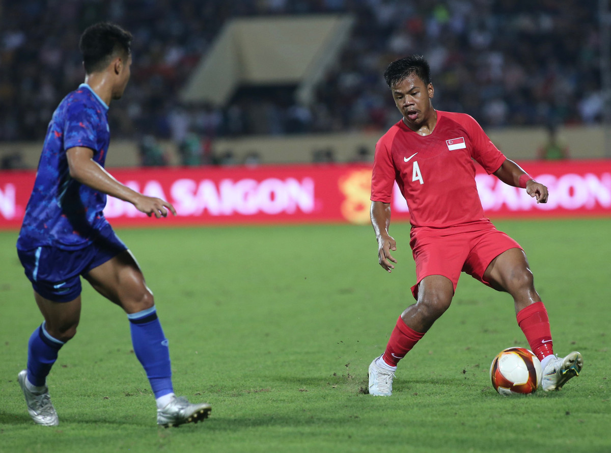 Thang 5 sao Singapore, U23 Thai Lan tro lai voi cuoc dua ban ket