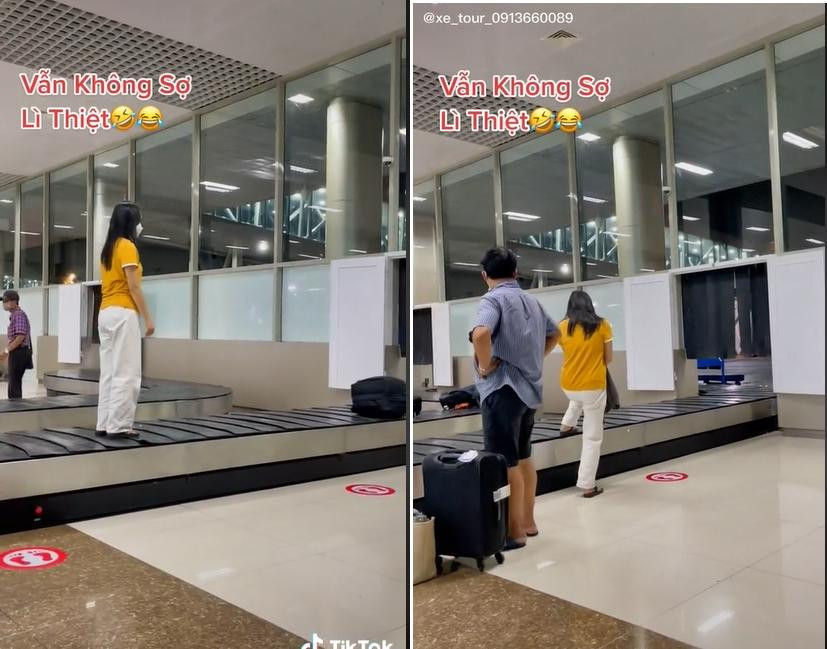 Ở những giây đầu của video, cô gái này định bước lên băng chuyền nhưng sau đó lại thôi.