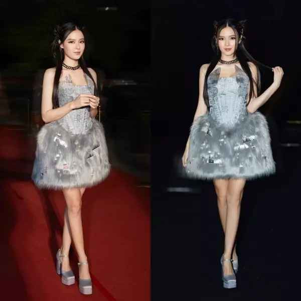 Diện bộ váy cúp ngực được thiết kế điệu đà cùng cách trang điểm cầu kỳ, nàng hot girl 8X đẹp nổi bật.